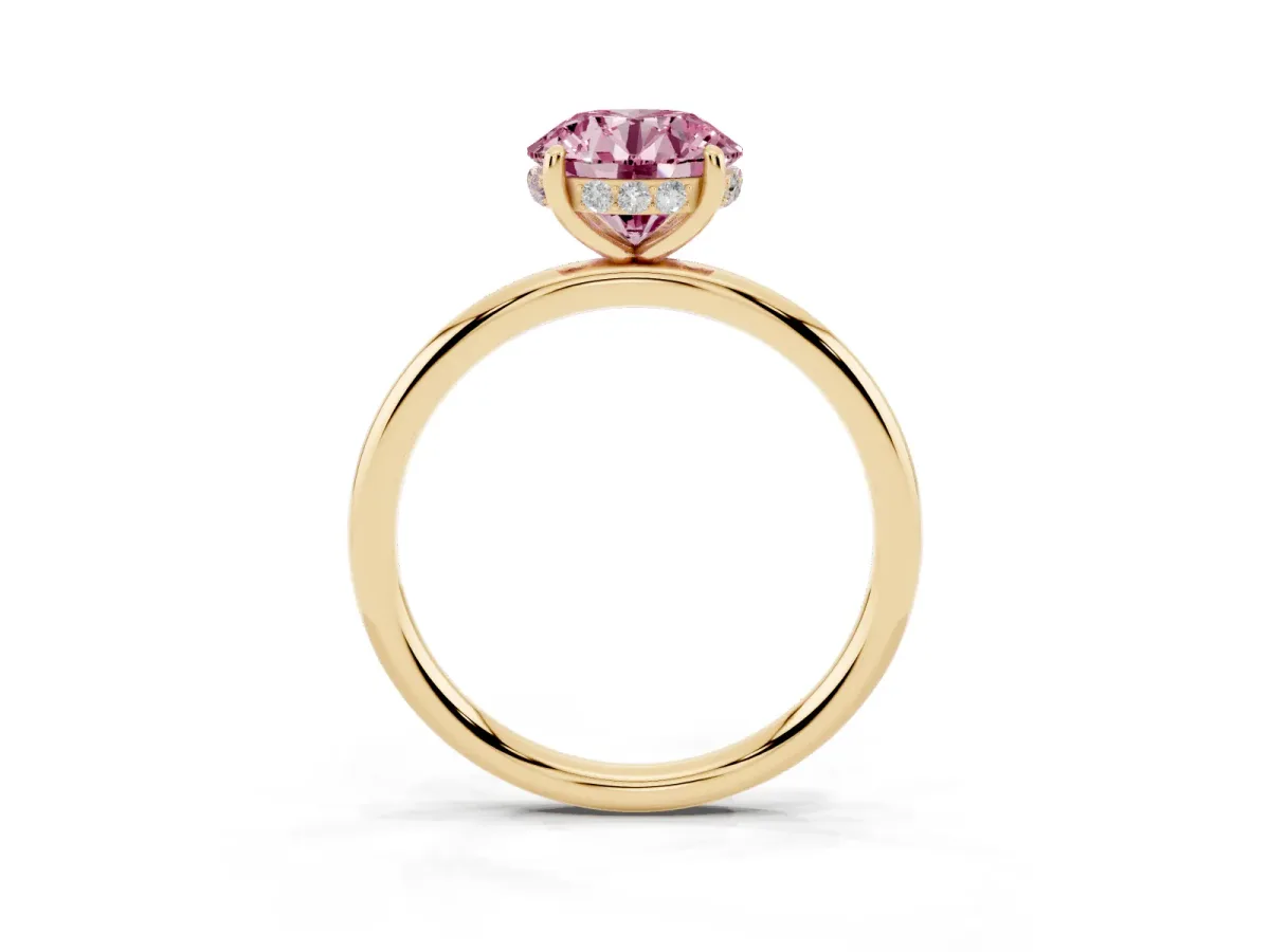 Fancy Pink Round Cut Solitaire Diamond Ring with a Classic Band and Four-Prong Setting Yellow gold