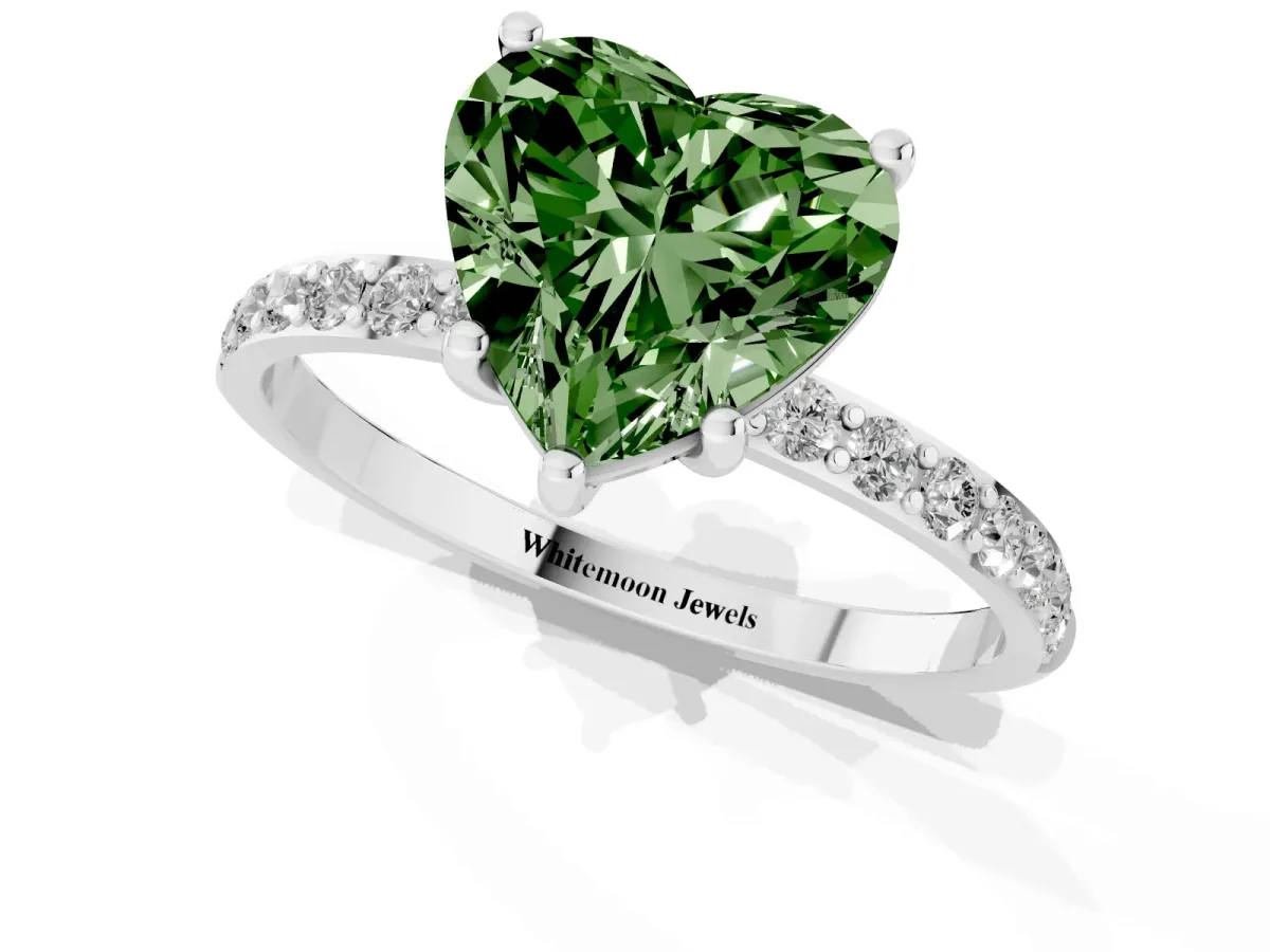 Fancy Green Heart Cut Diamond Solitaire Ring with Round Pavé Shoulders and Prong Setting Silver