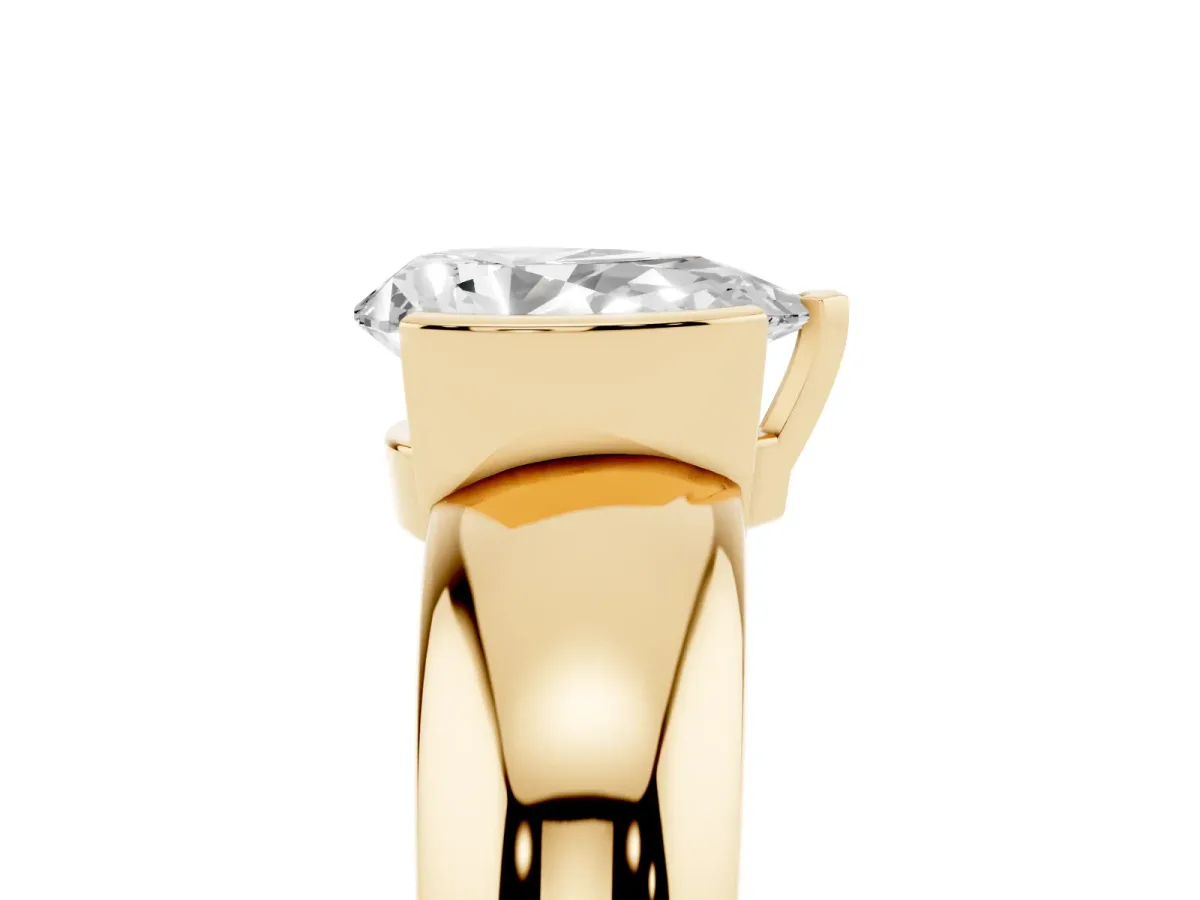 Pear Cut Solitaire Tension Set Diamond Ring with Wide Band Yellow gold