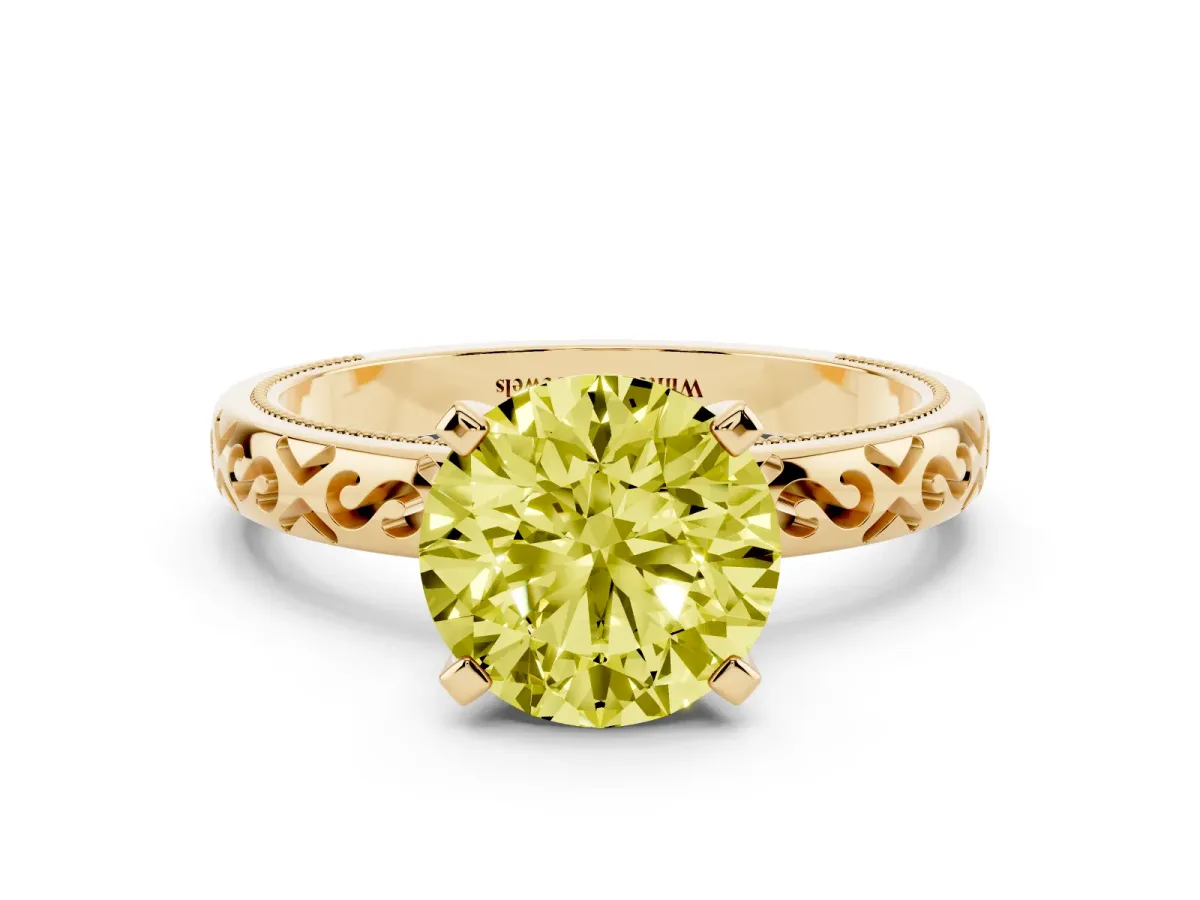 Fancy Yellow Round Cut Solitaire Engagement Ring with Scrollwork Band and Four-Prong Setting Yellow gold