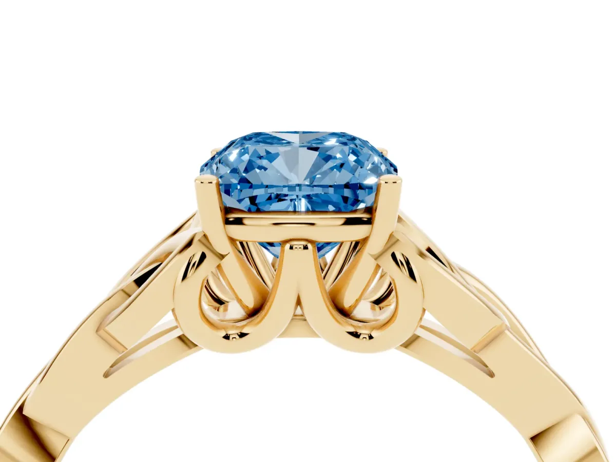 Fancy Blue Cushion Cut Diamond Solitaire Engagement Ring with Celtic Knot Band and Four-Prong Setting Yellow gold