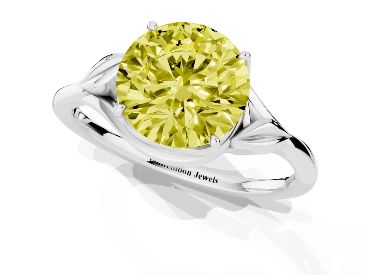 Fancy Yellow Round Cut Diamond Solitaire Ring with Twist Band and Four-Prong Setting Silver