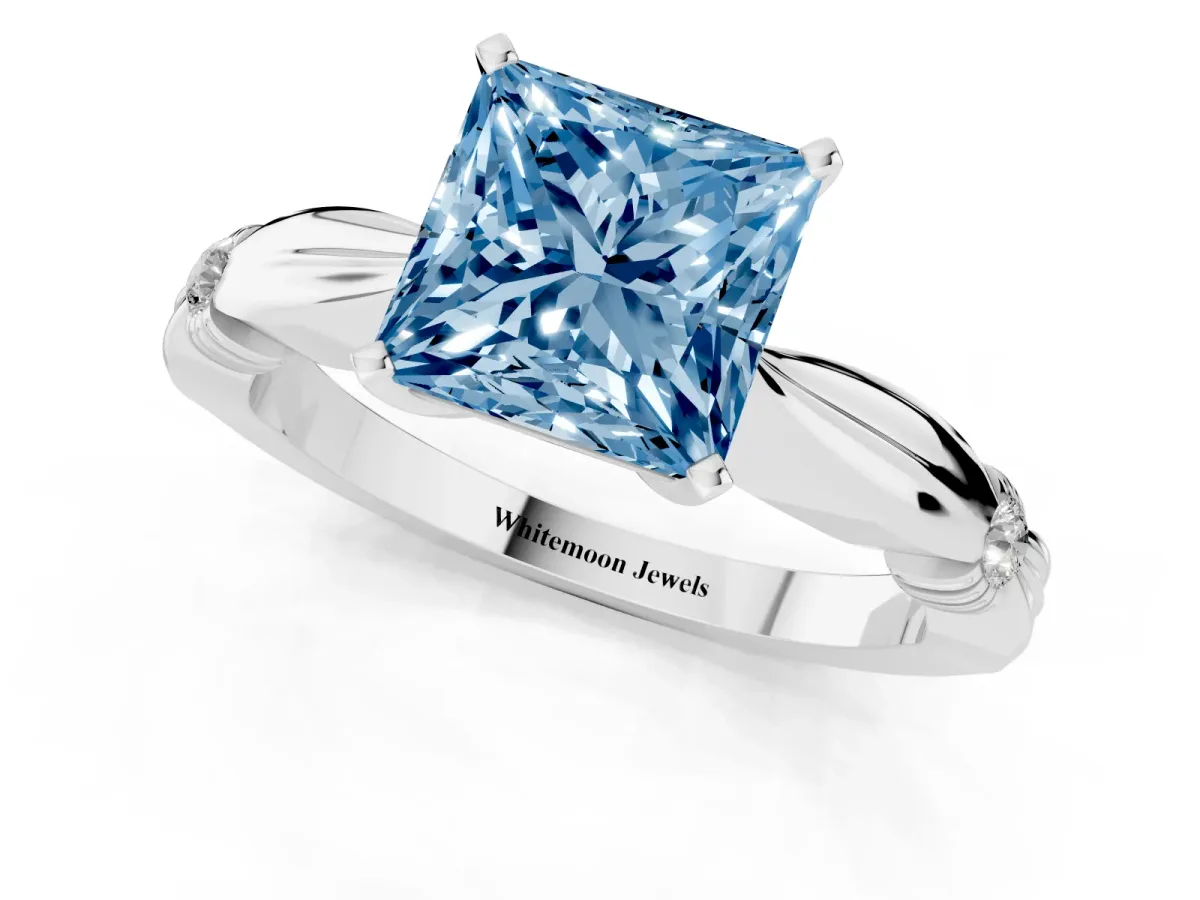 Fancy Blue Princess Cut Solitaire Diamond Twisted Band with Four-Prong Setting Platinum