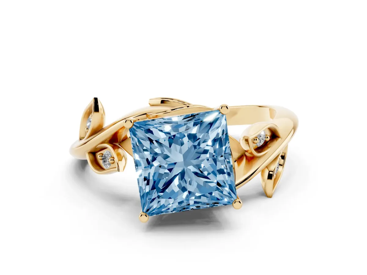 Fancy Blue Princess Cut Solitaire Twist Engagement Ring with Leaf Accents and Prong Setting Yellow gold