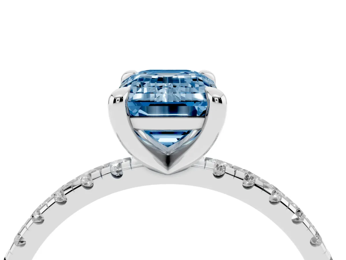 Fancy Blue Emerald Cut Diamond Brilliant Solitaire Ring with Pavé Band and Four-Prong Setting Silver