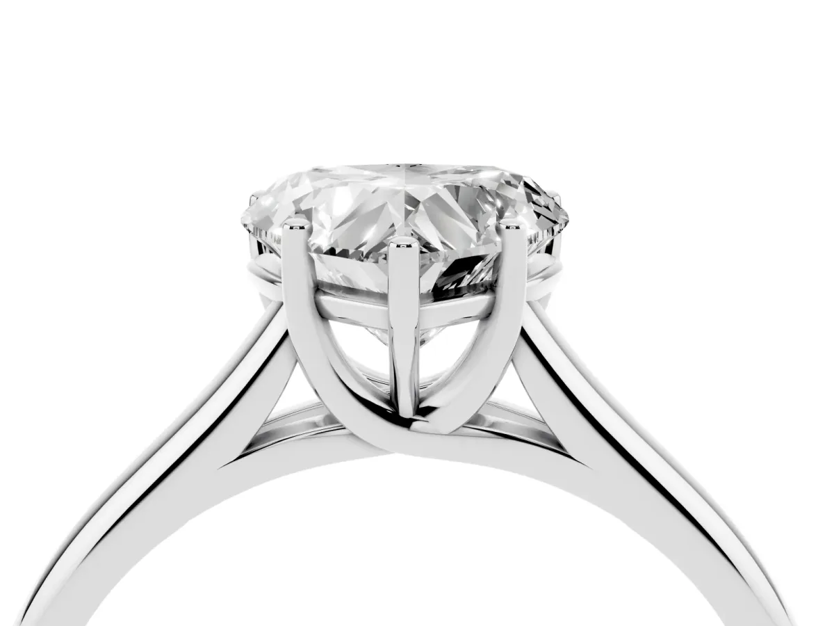 Heart Cut Cut Diamond Solitaire Engagement Ring with Tapered Plain Band and Four-Prong Setting Platinum