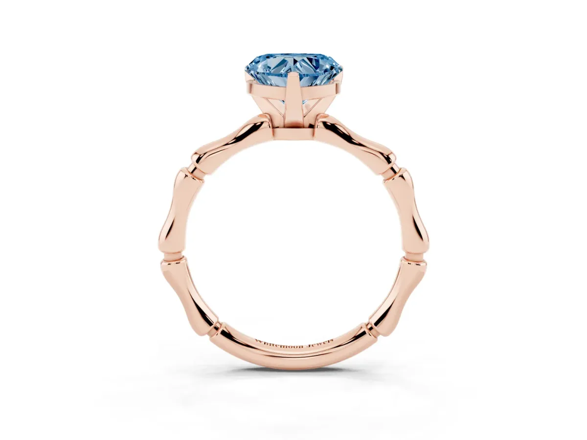 Fancy Blue Heart Cut Solitaire Diamond Ring with Bamboo Band and Four-Prong Setting Rose gold