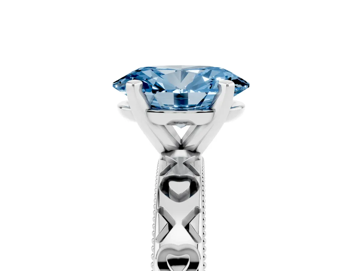 Fancy Blue Oval Cut Solitaire Diamond Engagement Ring with XO Engraved Band and Four-Prong Setting Silver