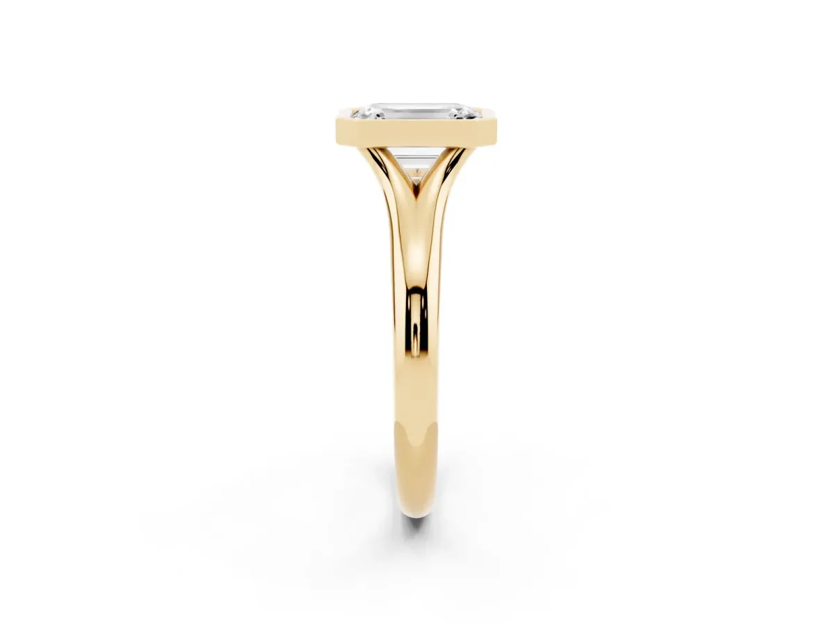 Bezel Set Emerald Cut Solitaire Diamond Ring with Smooth Band Yellow gold