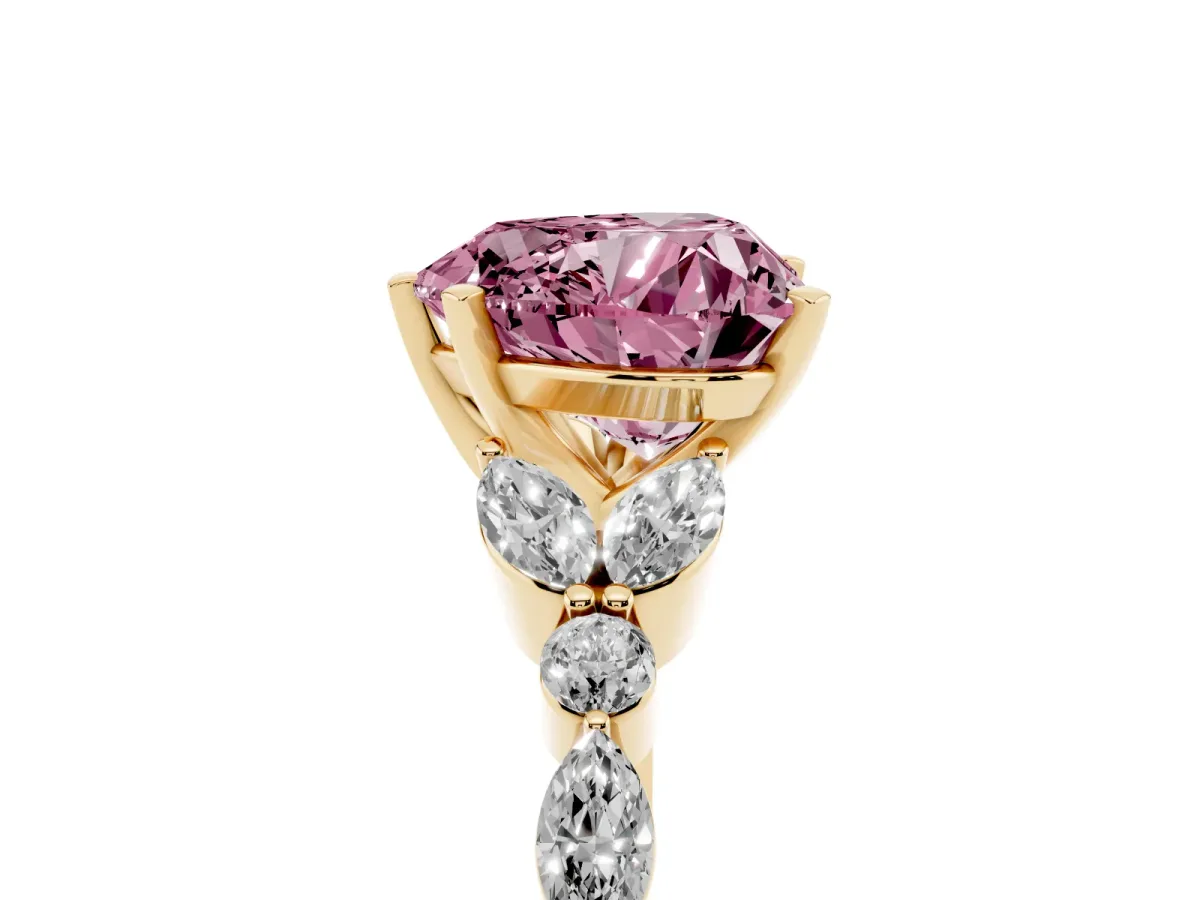 Fancy Pink Heart Cut Diamond Solitaire Ring with Side Stones and Four-Prong Setting Yellow gold