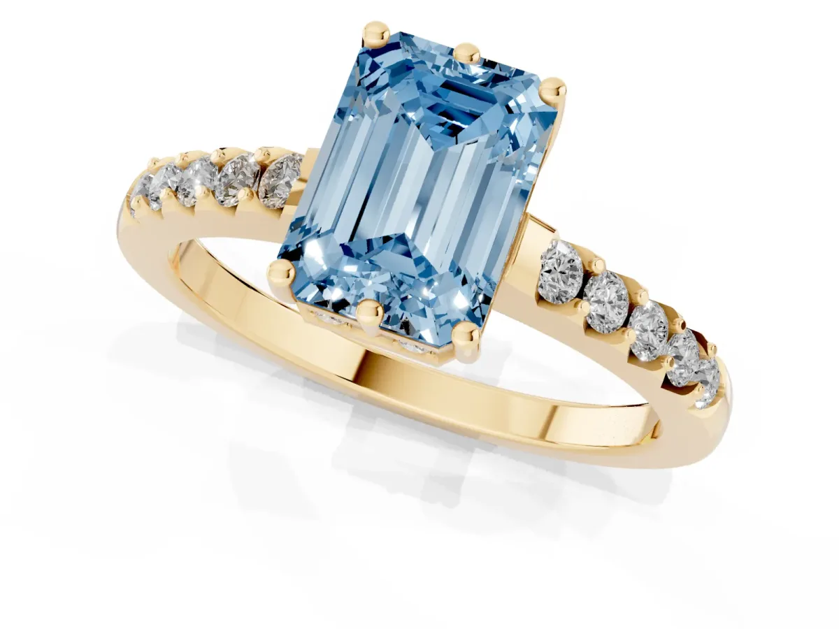Fancy Blue Emerald Cut Solitaire Diamond Engagement Ring with Pavé Band and Six-Prong Setting Yellow gold