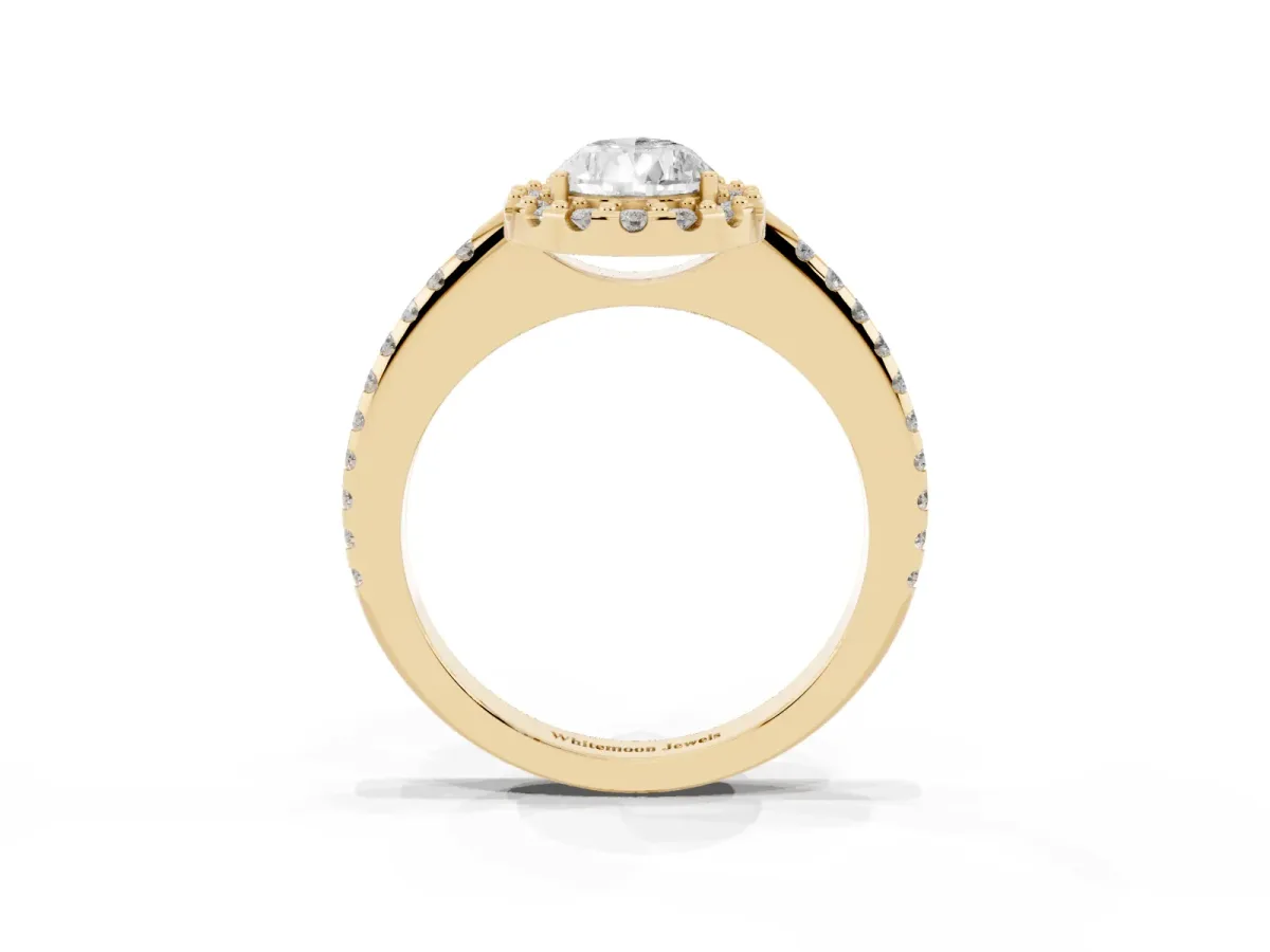 Pear Cut Diamond Pavé Halo Ring with Four-Prong Setting Yellow gold