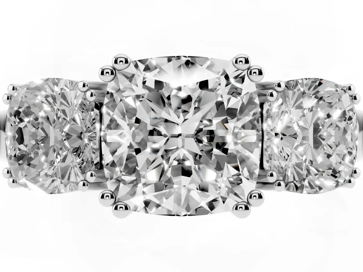 Three-Stone Cushion Cut Cut Diamond Ring with Channel Set Band and Four-Prong Setting Silver