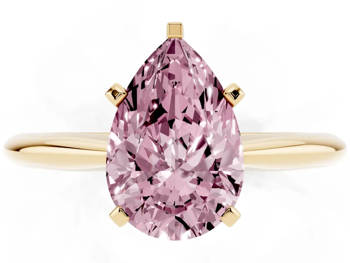 Fancy Pink Pear Cut Cut Solitaire Ring with Four-Prong Setting on a Classic Band Yellow gold