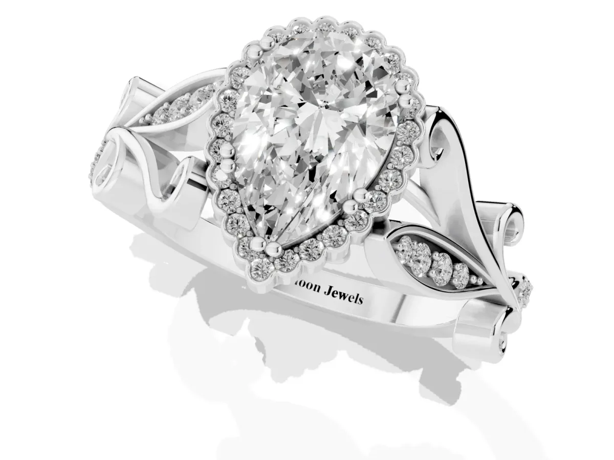 Pear Cut Diamond Halo Ring with Vintage Split Shank and Four-Prong Setting Platinum