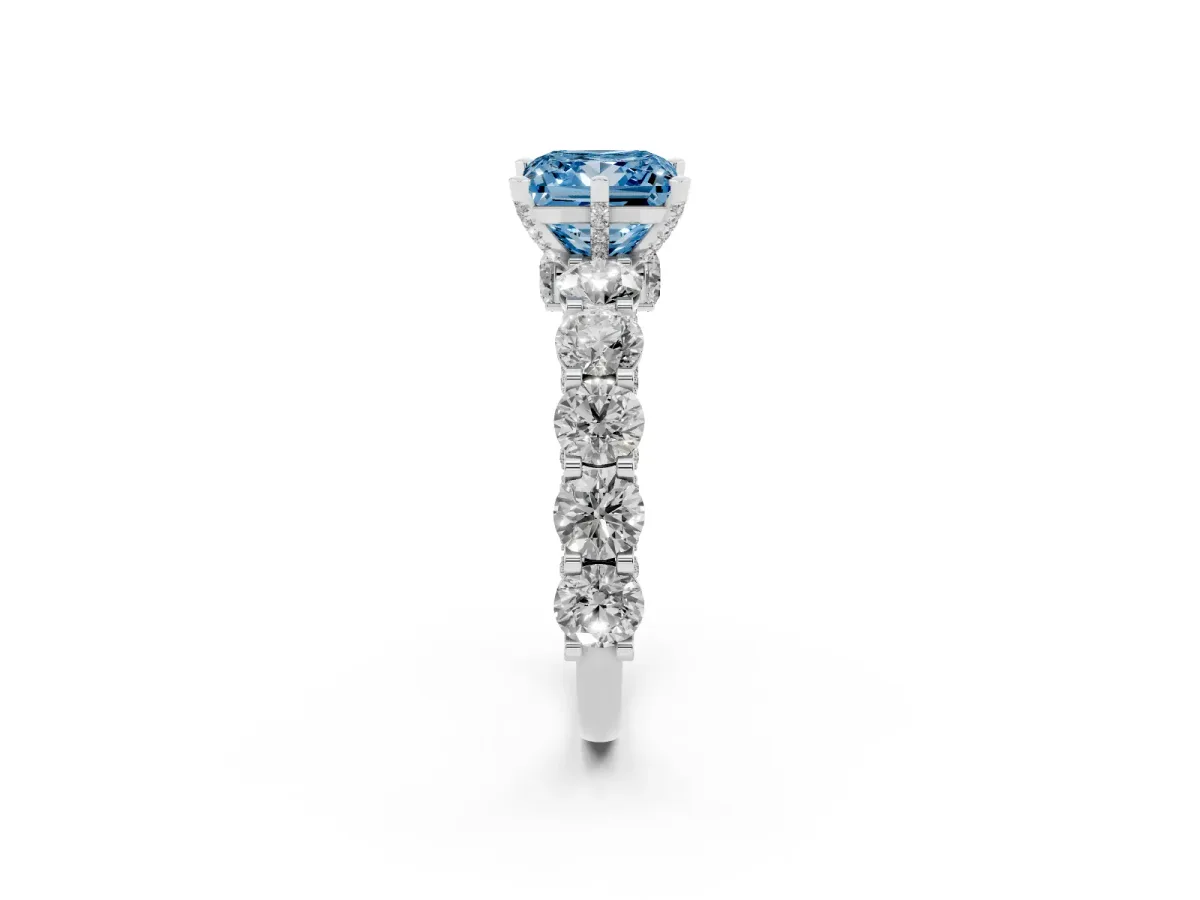 Fancy Blue Princess Cut Diamond Side Stone Engagement Ring with Four-Prong Setting Platinum