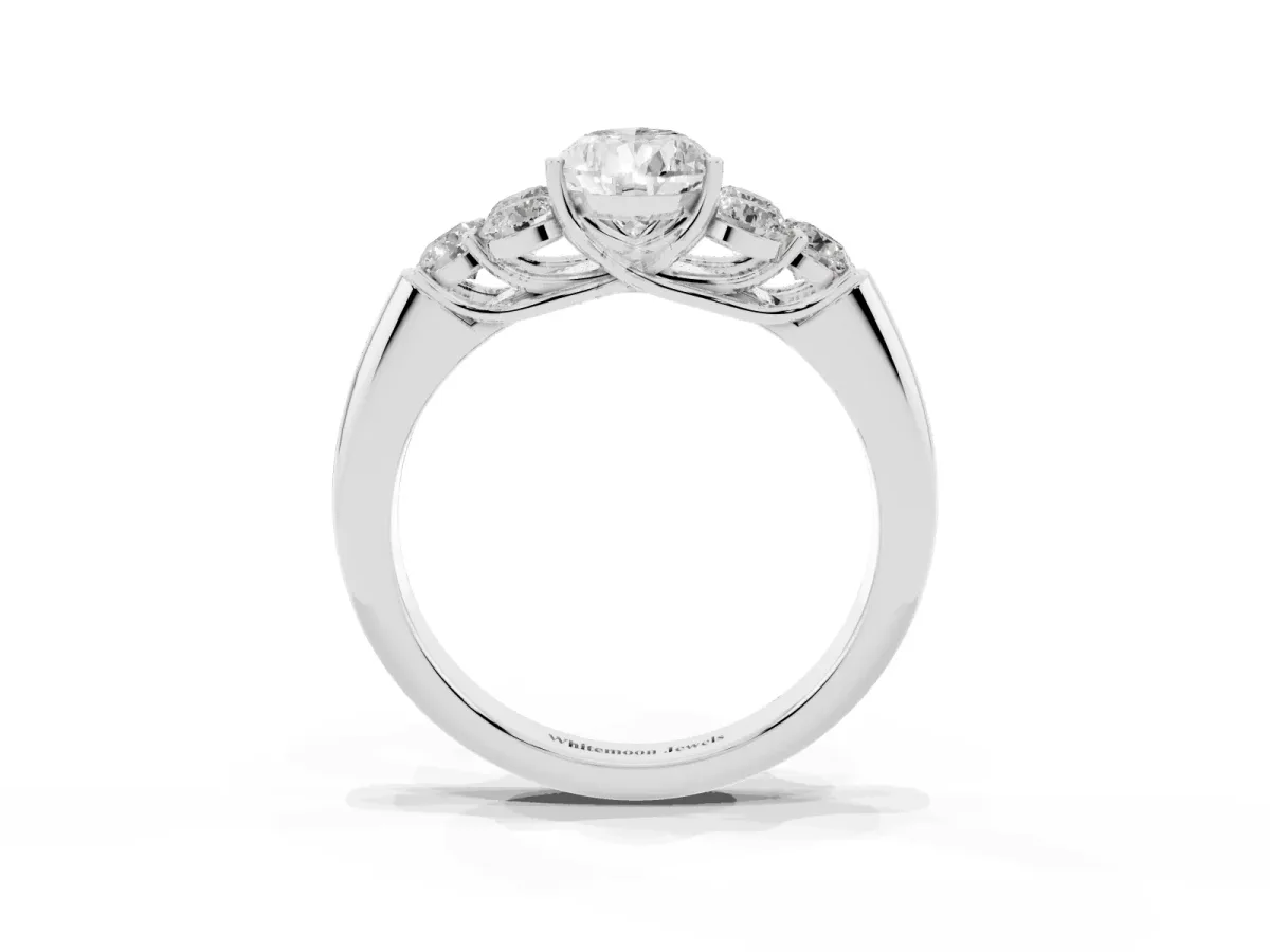 Pear Cut Cut Diamond Cluster Ring with Round Accent Stones and Prong Setting on a Classic Band White gold