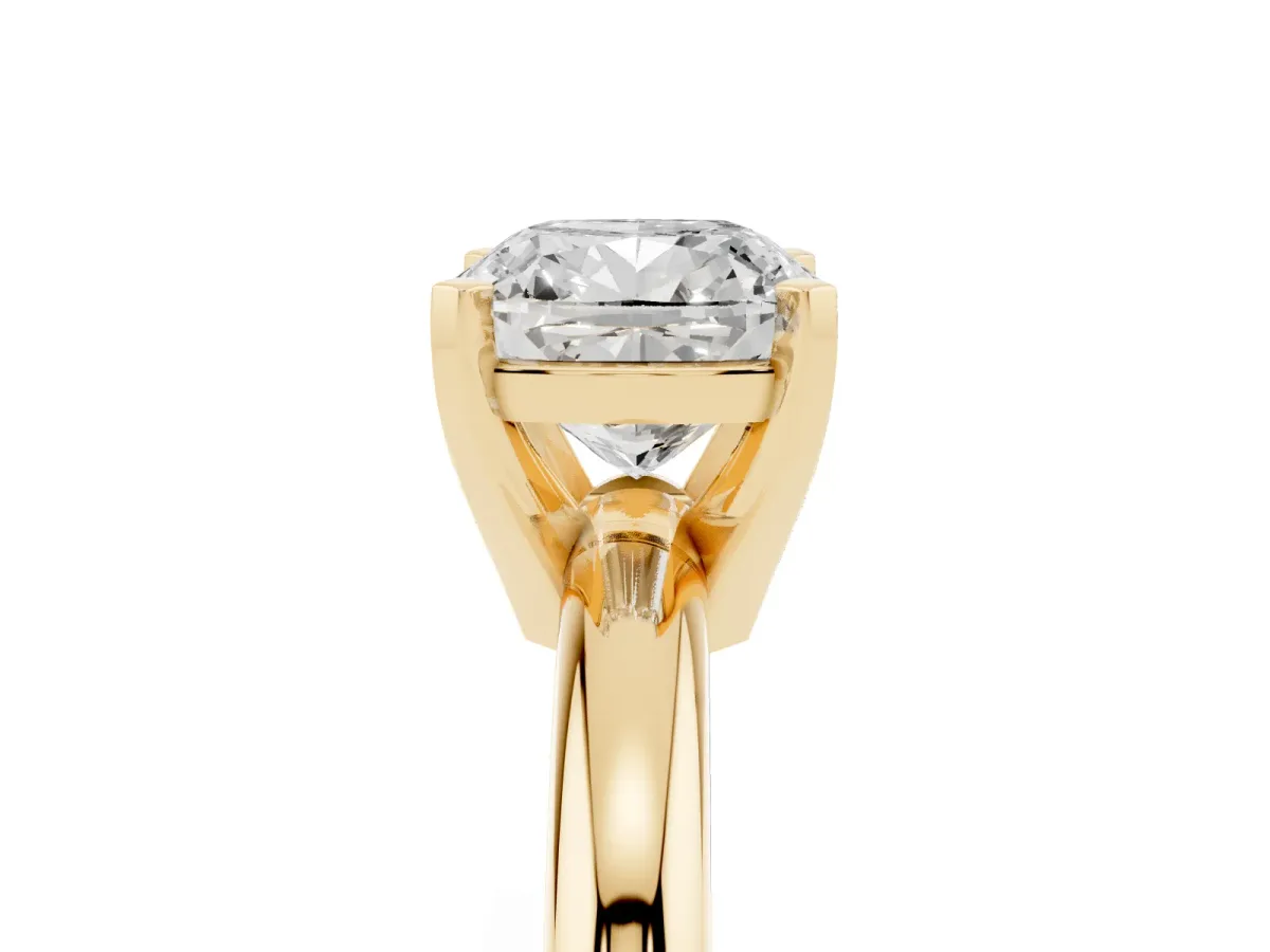 Cushion Cut Diamond Solitaire Engagement Ring with Round Band and Four-Prong Setting Yellow gold