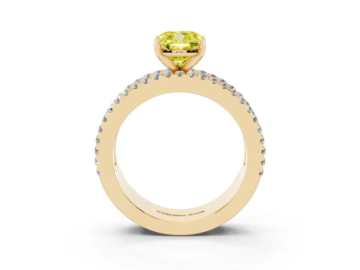 Fancy Yellow Cushion Cut Diamond Solitaire Ring with Pavé and Channel Set Band Yellow gold