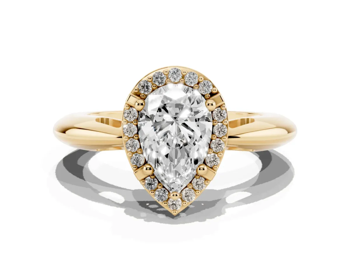 Pear Cut Cut Diamond Halo Engagement Ring with Split Shank and Four-Prong Setting Yellow gold