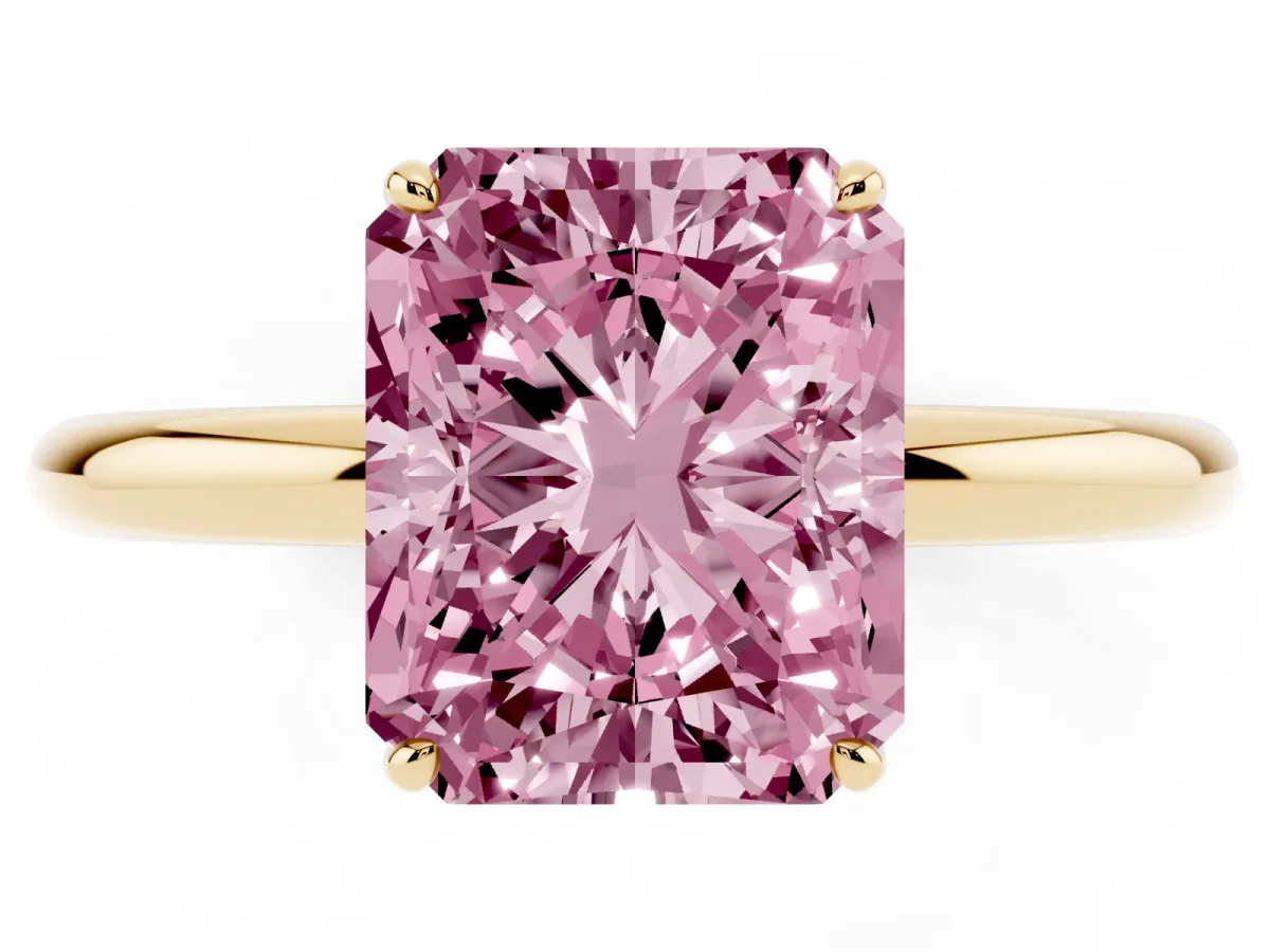 Fancy Pink Radiant Cut Solitaire Diamond Ring with Four-Prong Setting on a Plain Band Yellow gold
