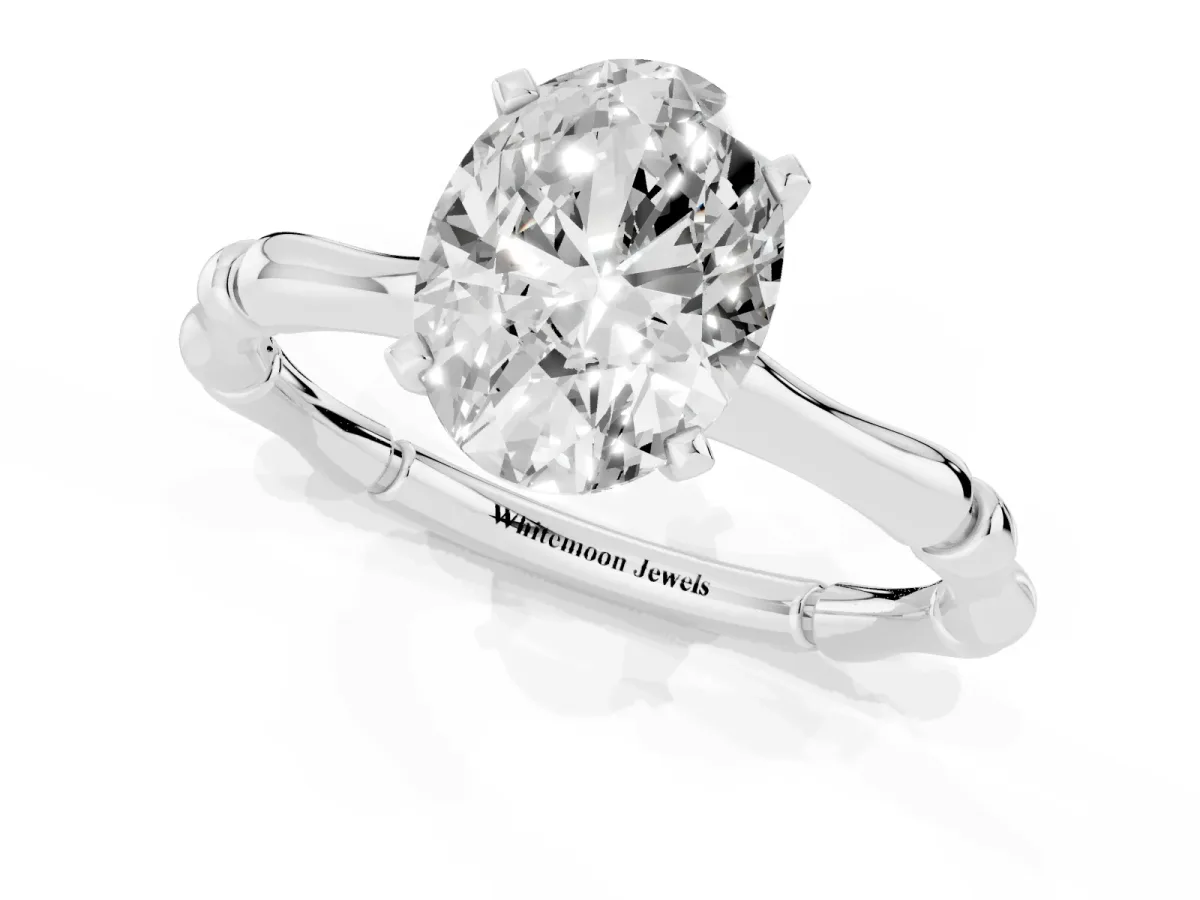 Oval Cut Solitaire Diamond Ring with Bamboo Band and Four-Prong Setting Silver