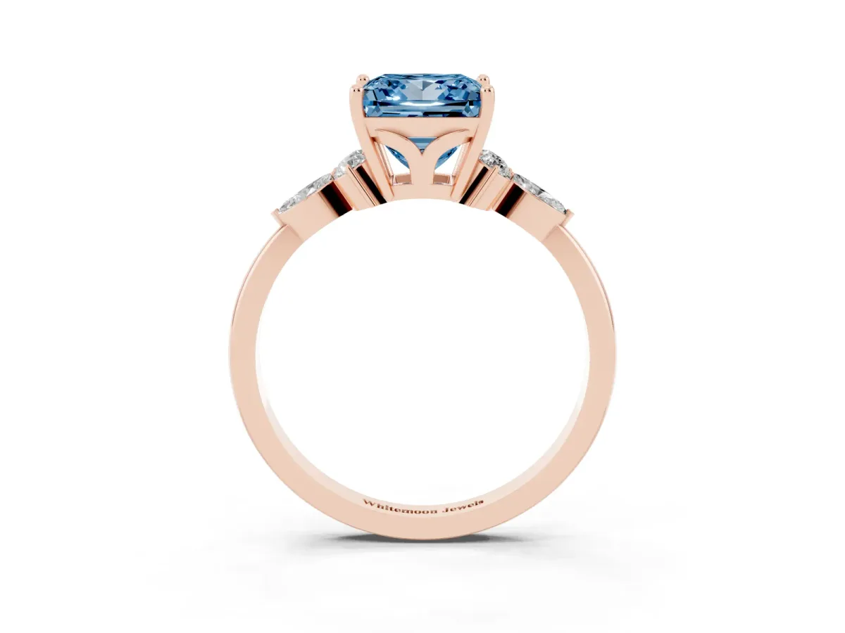 Fancy Blue Princess Cut Brilliant Diamond Solitaire Ring with Pear Side Stones and Four-Prong Setting Rose gold