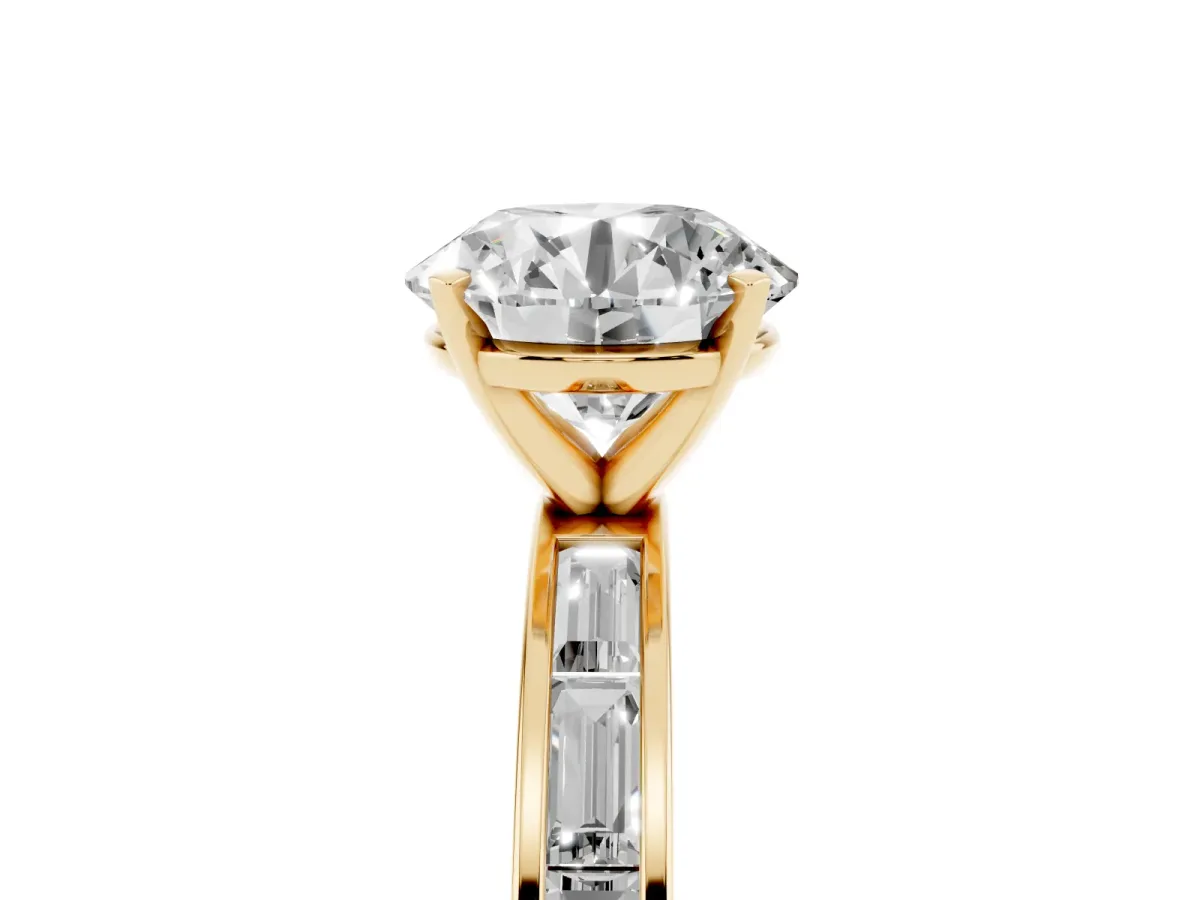 Round Cut Solitaire Diamond Ring with Channel-Set Baguette Band and Four-Prong Setting Yellow gold