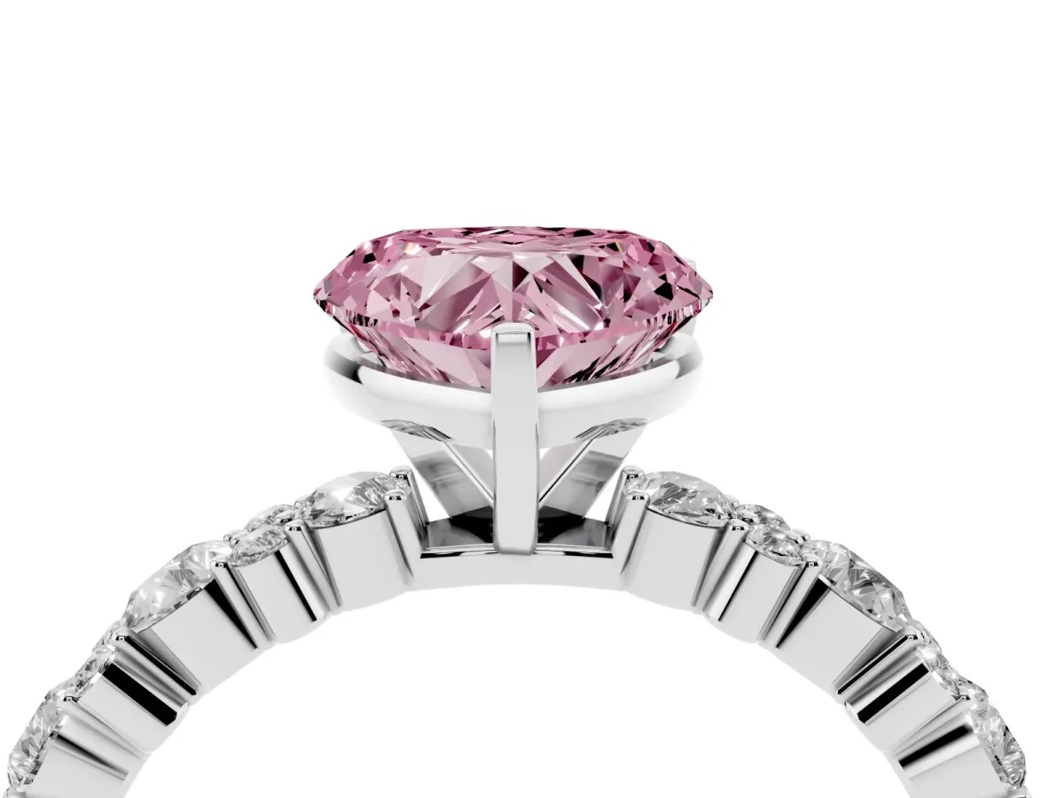 Fancy Pink Heart Cut Diamond Side Stone Solitaire Ring with Round and Four-Prong Setting Platinum