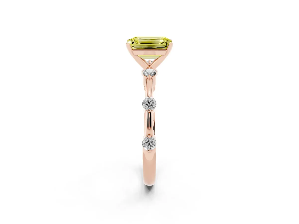 Fancy Yellow Emerald Cut Solitaire Diamond Ring with Bezel Set Side Stones and Prong Setting Rose gold