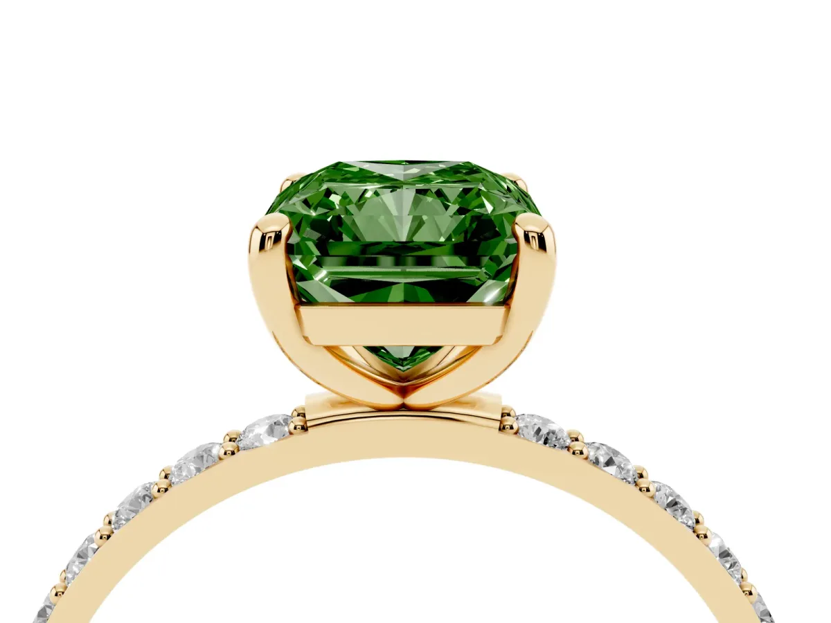 Fancy Green Radiant Cut Diamond Solitaire Ring with Round Pavé Band and Prong Setting Yellow gold
