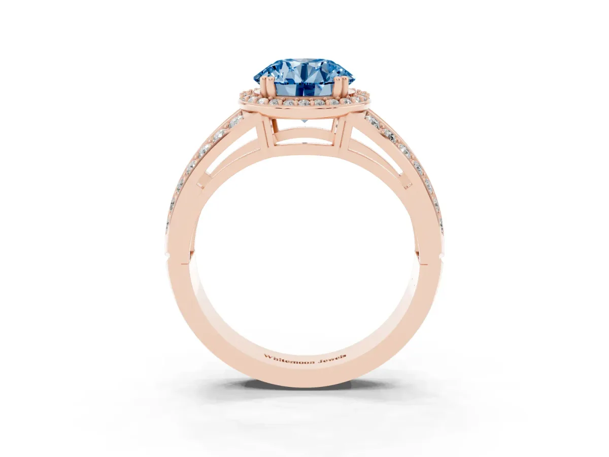 Fancy Blue Round Cut Diamond Halo Ring with Split Shank Pavé Band and Four-Prong Setting Rose gold