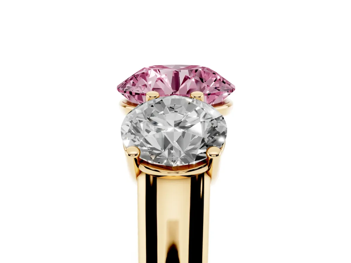 Fancy Pink Round Cut Three-Stone Diamond Ring with Prong Setting on a Classic Band Yellow gold