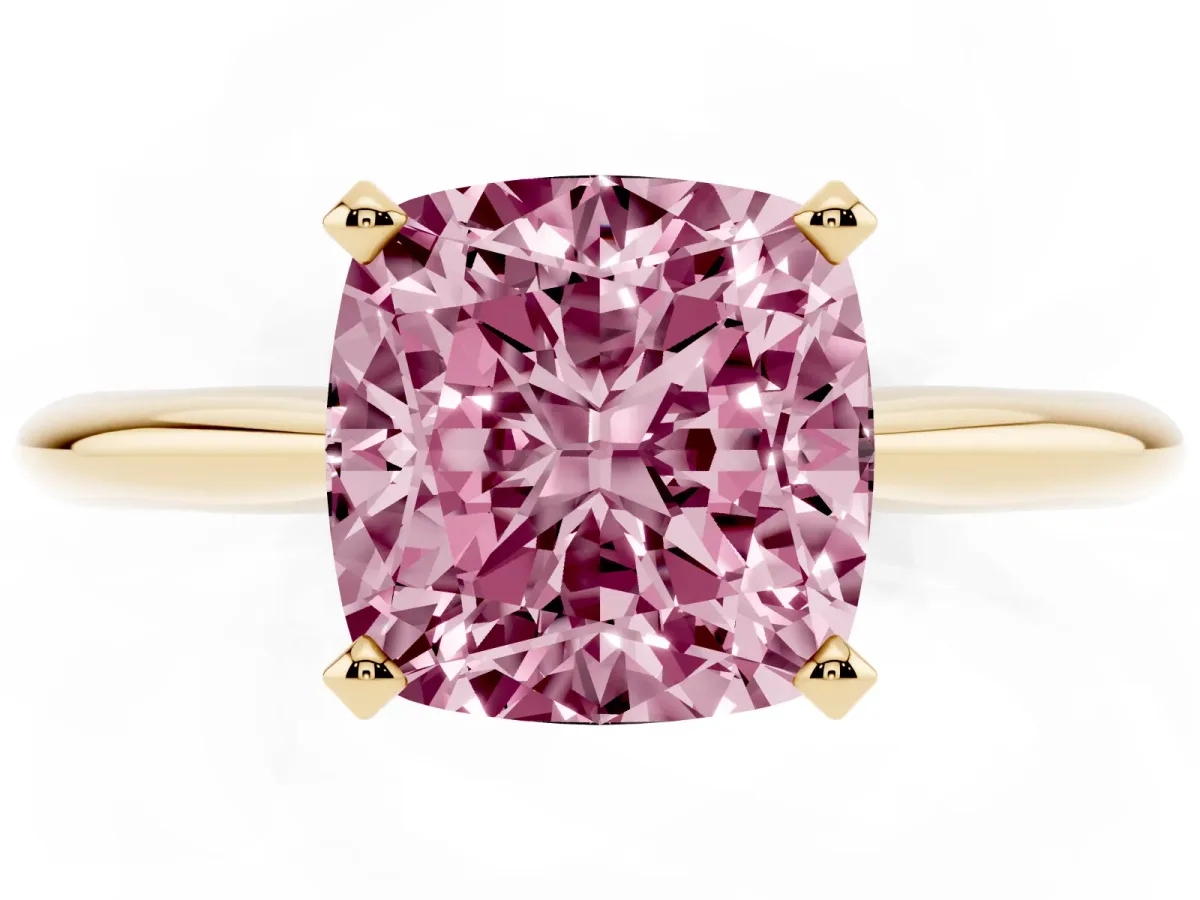 Fancy Pink Cushion Cut Cut Solitaire Ring with Four-Prong Setting on a Classic Band Yellow gold