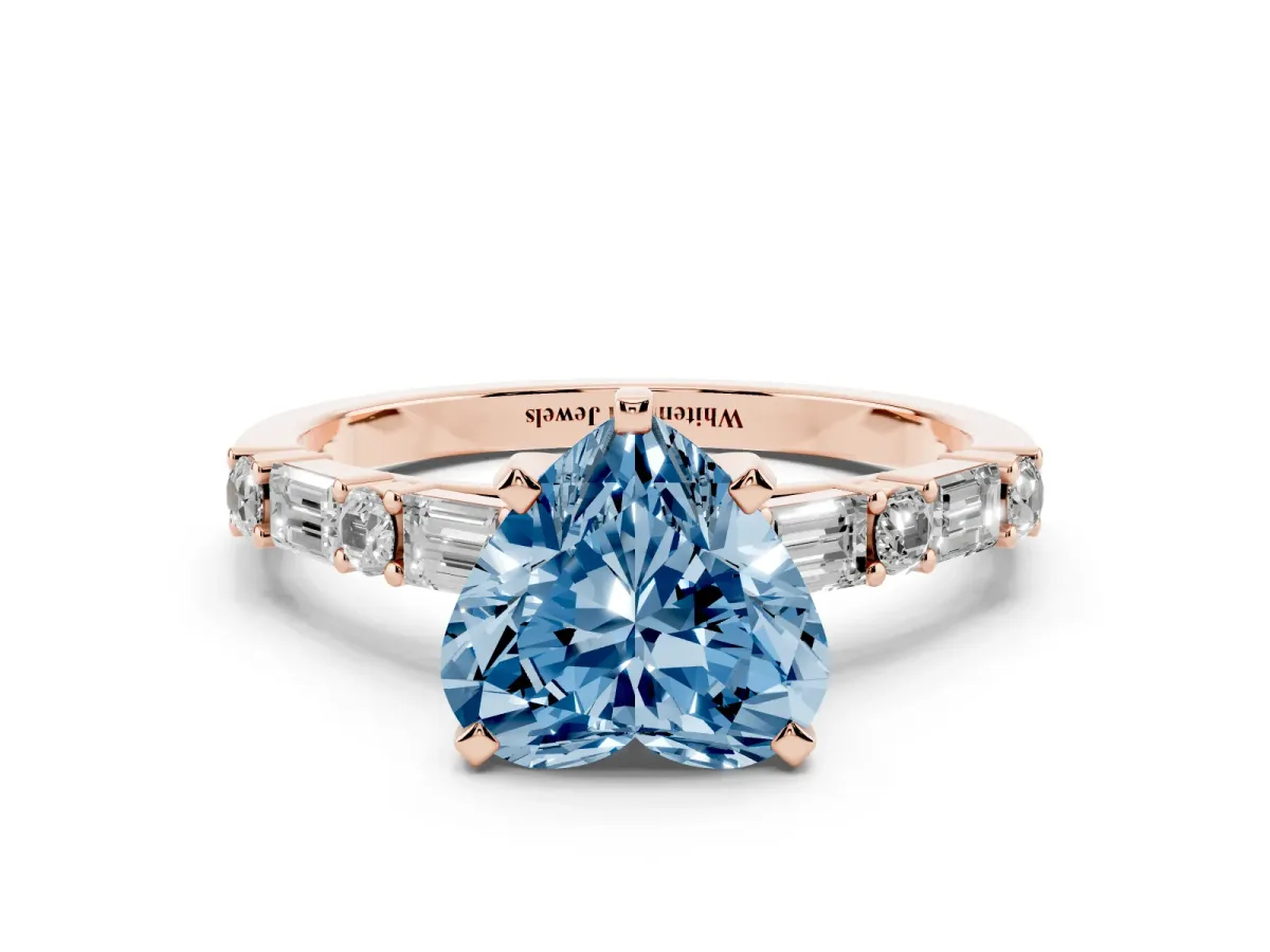 Fancy Blue Heart Cut Diamond Solitaire with Side Baguettes and Channel Set Band Rose gold