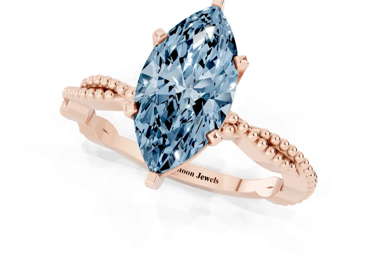 Fancy Blue Marquise Cut Solitaire Twisted Band with Bead Prong Setting Rose gold