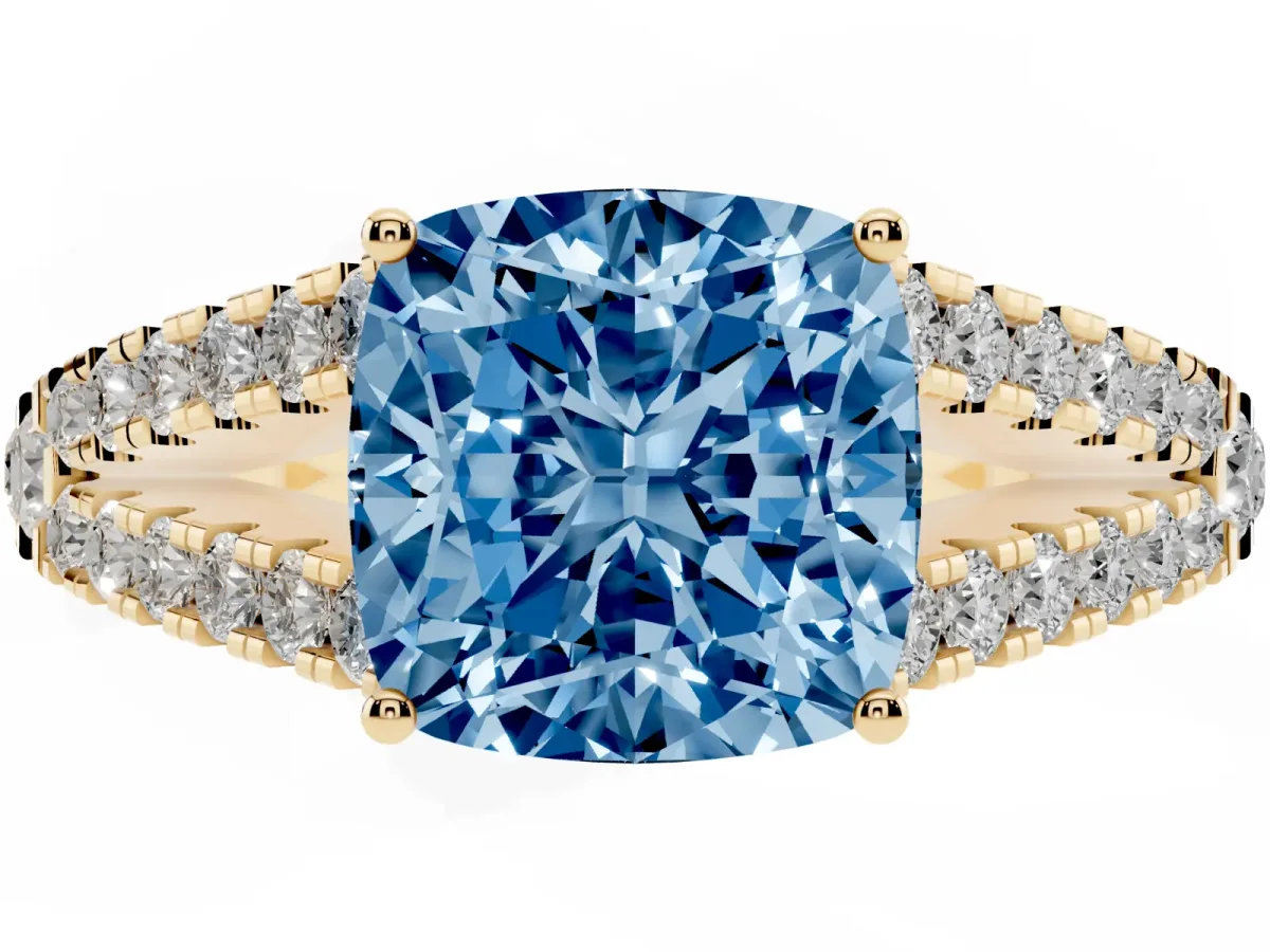 Fancy Blue Cushion Cut Diamond Split Shank Pavé Engagement Ring with Four-Prong Setting Yellow gold