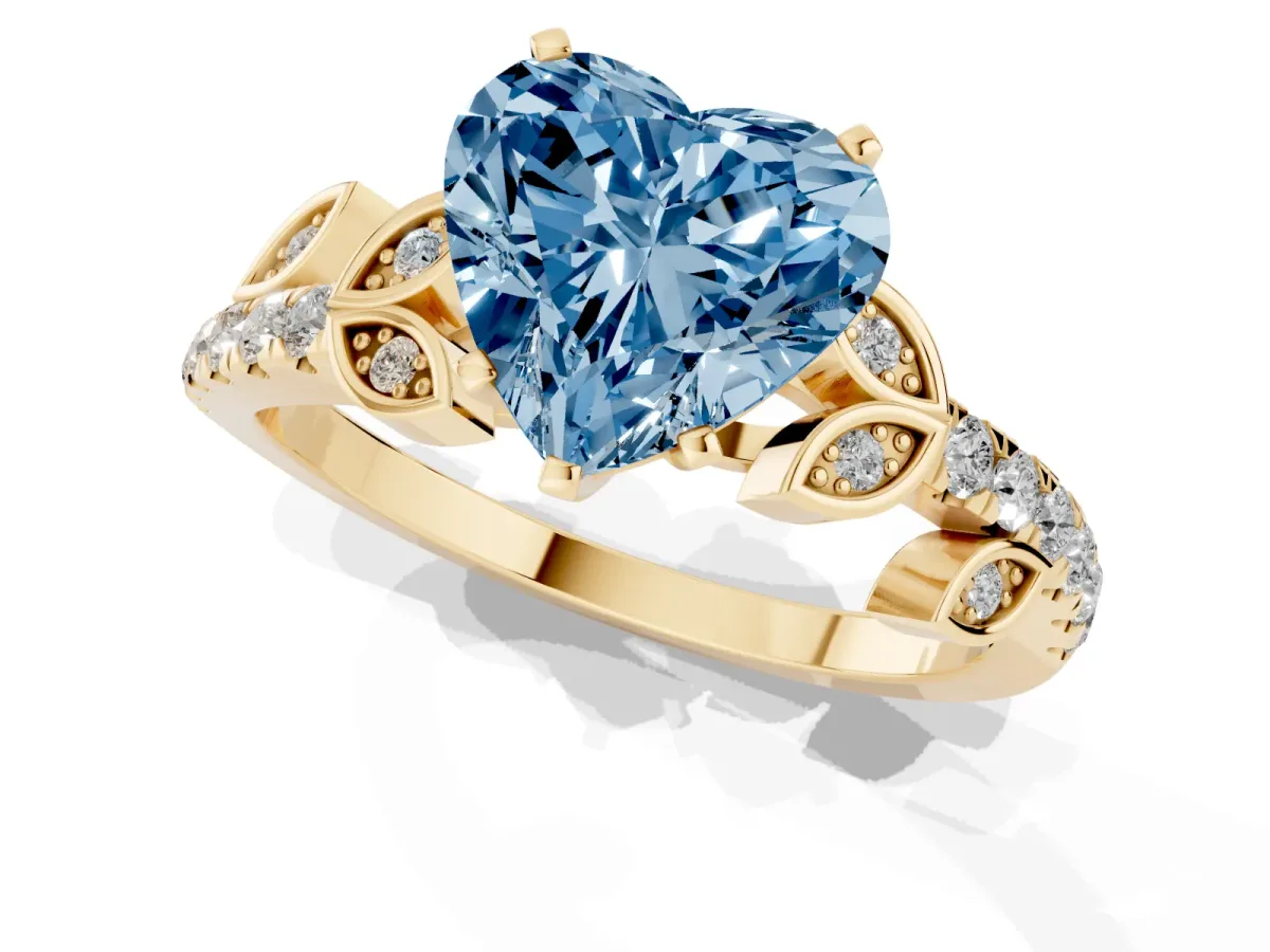 Fancy Blue Heart Cut Solitaire Leaf-Inspired Diamond Ring with Pavé Band and Four-Prong Setting Yellow gold