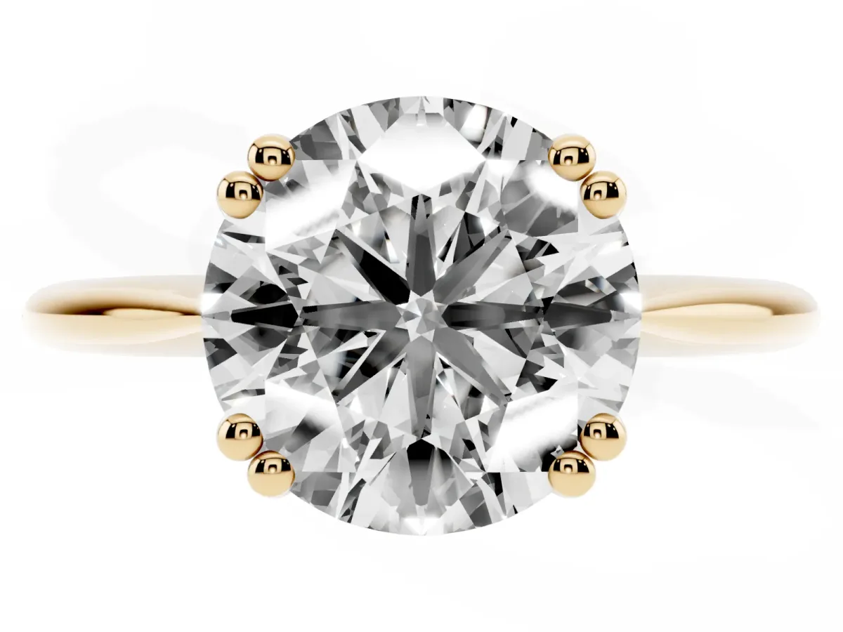 Round Cut Solitaire Diamond Ring with Six-Prong Setting and Classic Band Yellow gold