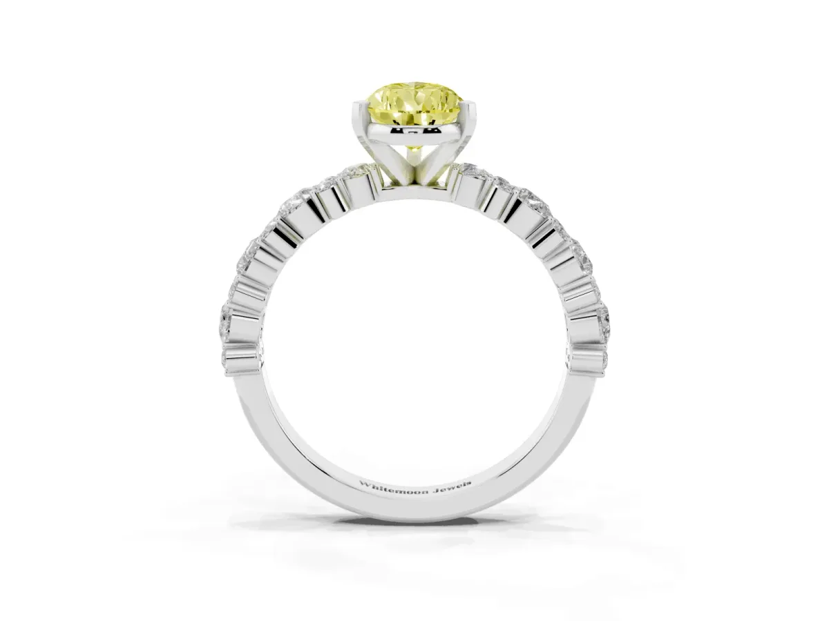 Fancy Yellow Pear Cut Diamond Side Stone Solitaire Ring with Round and Four-Prong Setting Platinum