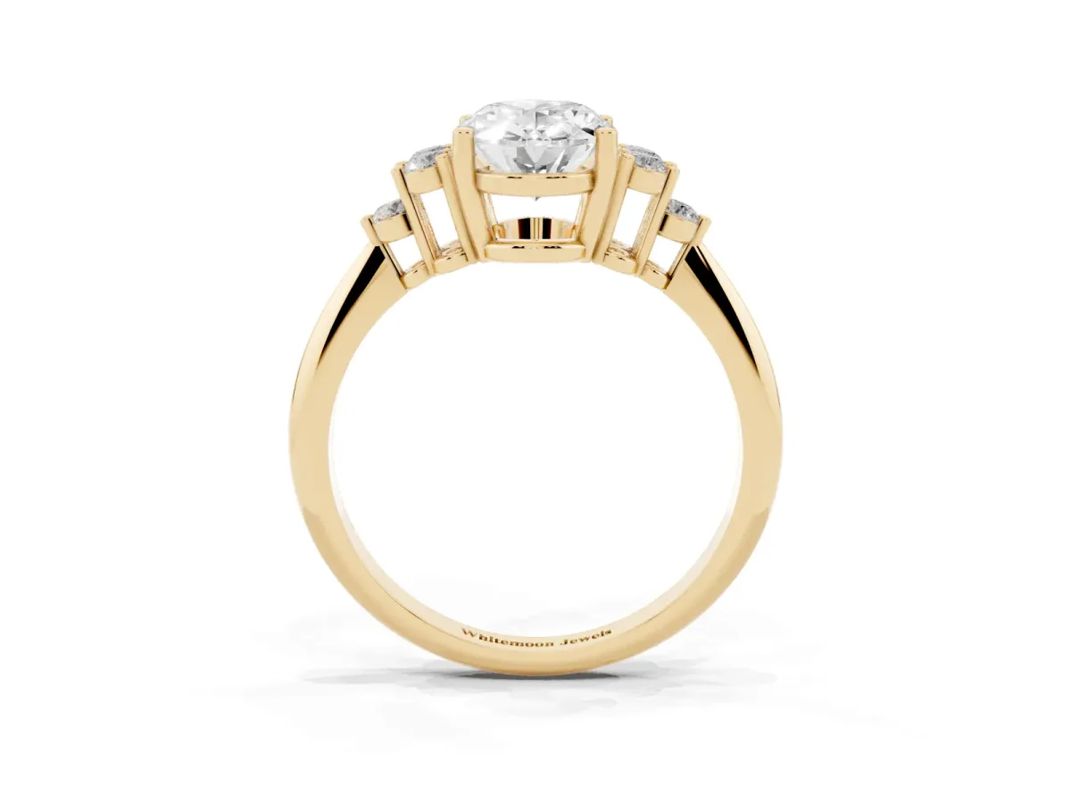 Oval Cut Cut Diamond Cluster Ring with Solitaire Band and Four-Prong Setting Yellow gold