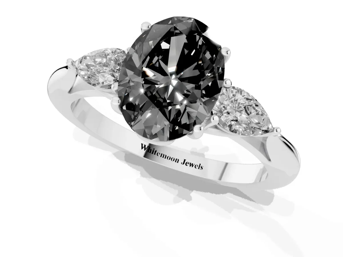 Fancy Black Oval Cut Diamond Three-Stone Ring with Pear Side Stones and Prong Setting Platinum