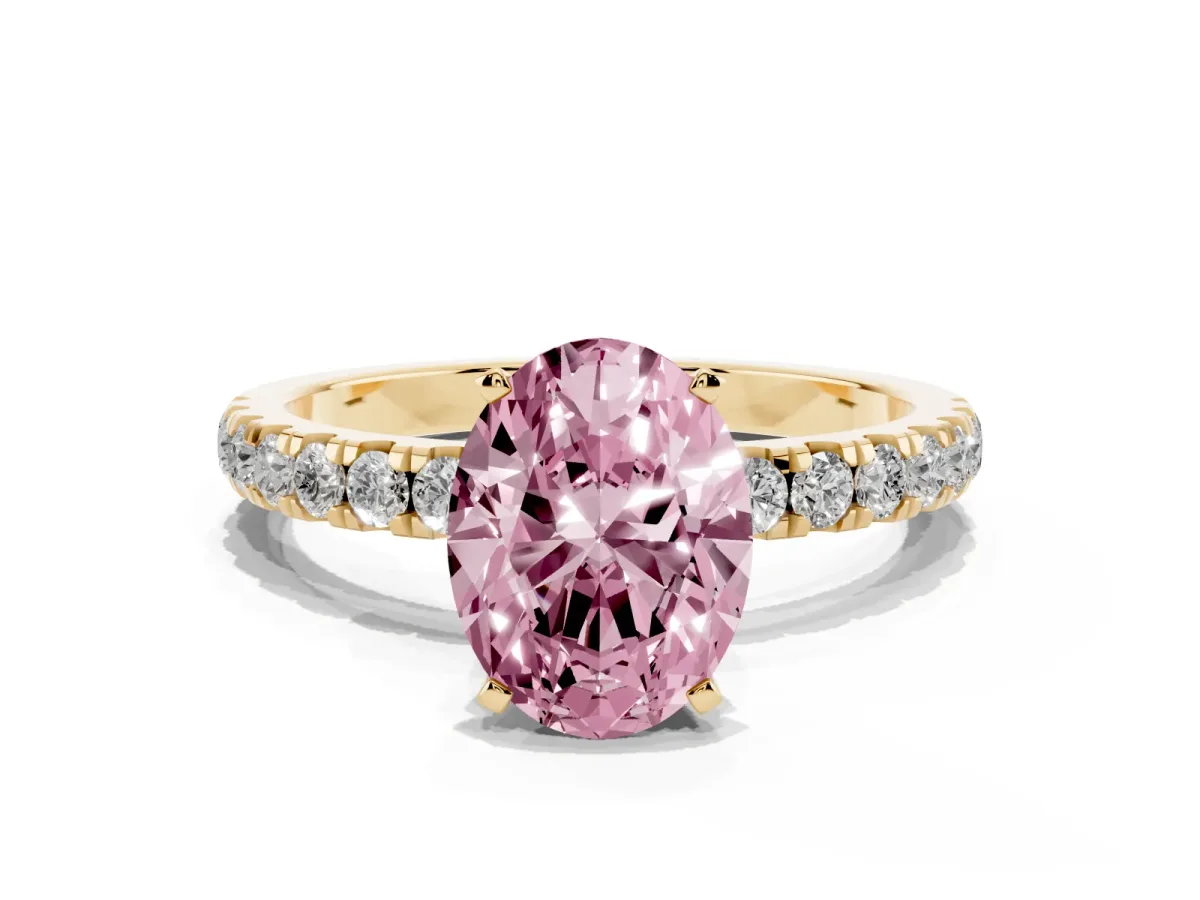 Fancy Pink Oval Cut Diamond Solitaire Ring with Pavé Accents and Four-Prong Setting Yellow gold