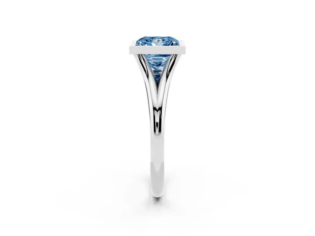 Fancy Blue Bezel Set Princess Cut Cut Solitaire Ring with Tapered Band Silver