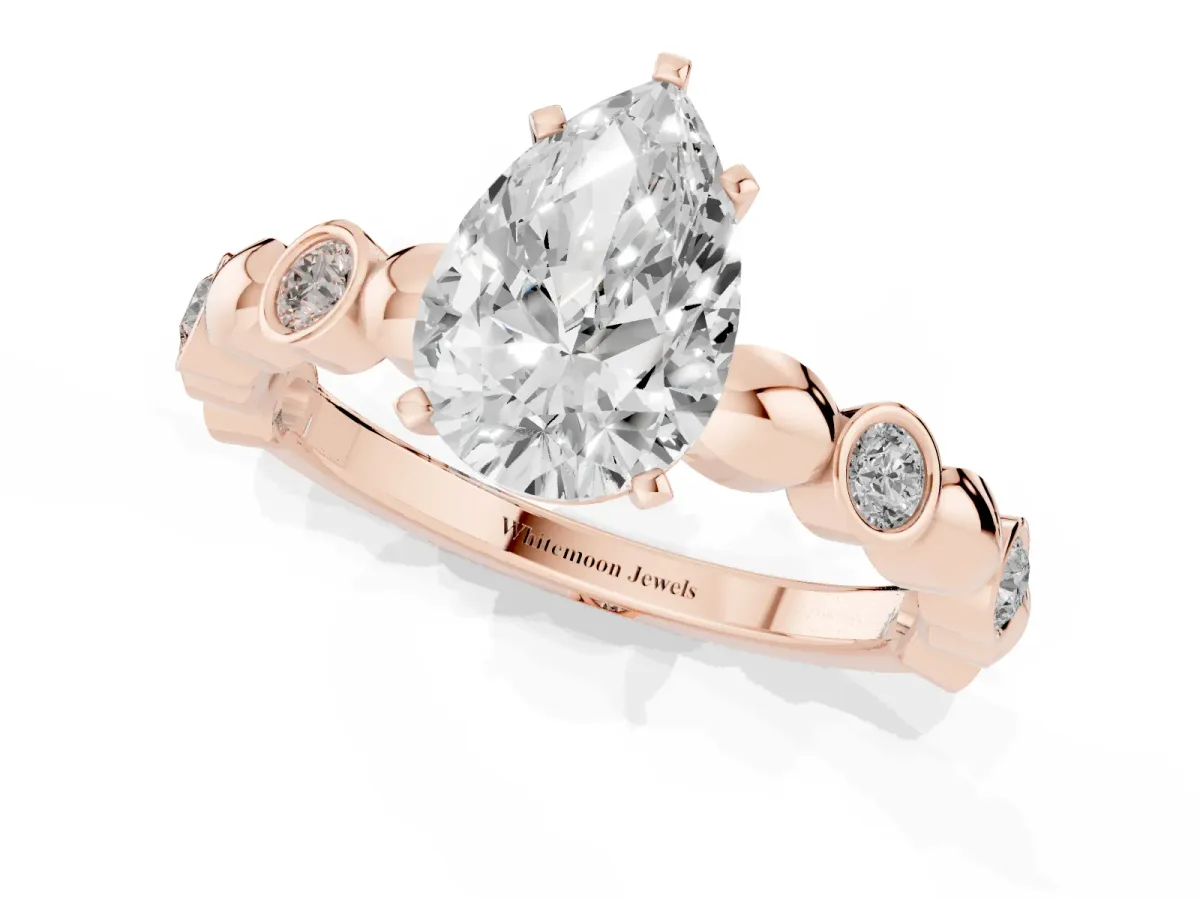 Pear Cut Solitaire Bezel-Set Diamond Ring with Beaded Band and Four-Prong Setting Rose gold