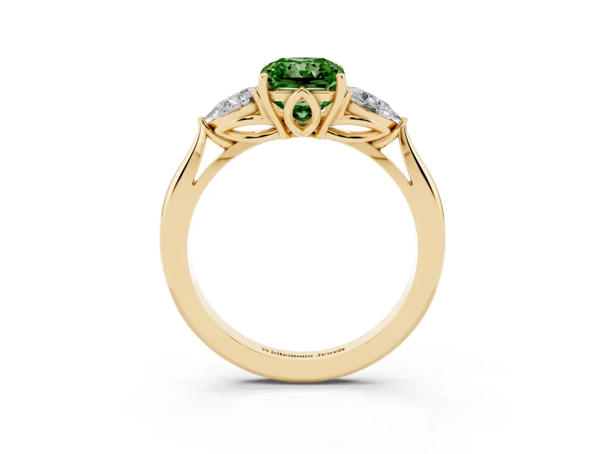 Fancy Green Three-Stone Radiant Cut Diamond Ring with Pear Side Stones in Four-Prong Setting Yellow gold