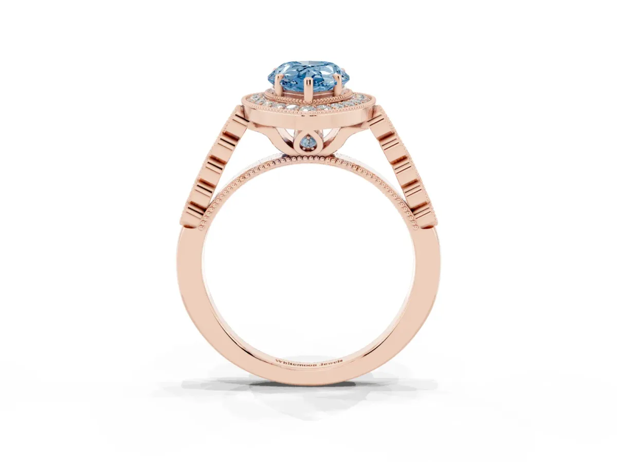 Fancy Blue Pear Cut Halo Milgrain Solitaire with Bezel Set Side Stones and Pave Band Rose gold
