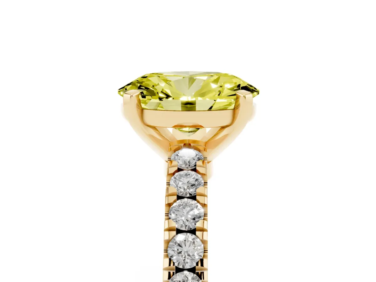 Fancy Yellow Oval Cut Solitaire Diamond with Pavé Band and Four-Prong Setting Yellow gold