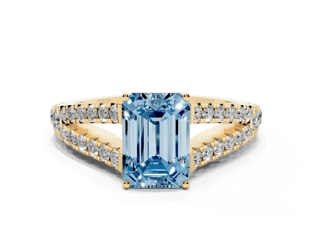 Fancy Blue Emerald Cut Diamond Split Shank Engagement Ring with Round Pavé and Prong Setting Yellow gold