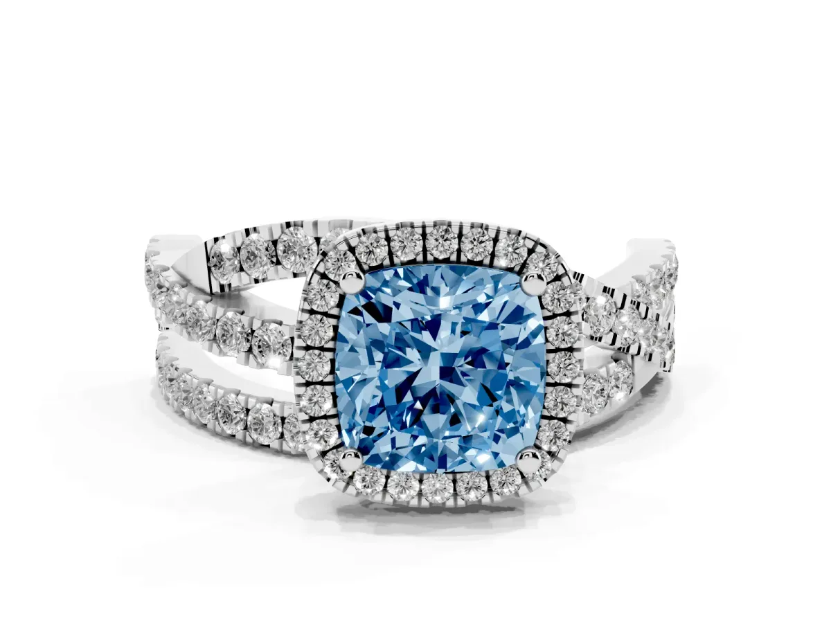 Fancy Blue Cushion Cut Diamond Halo Ring with Round Split Shank and Prong Setting Platinum